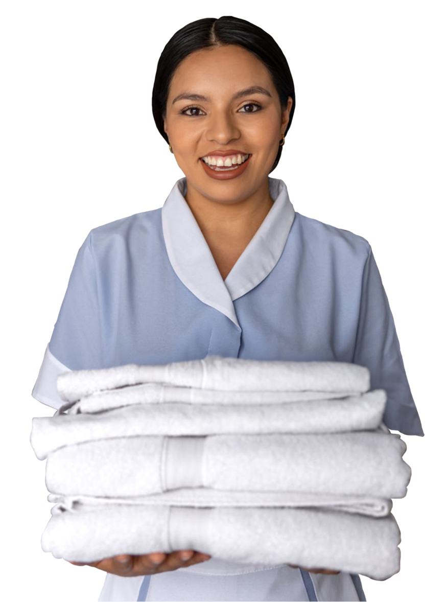 Worker holding folded linens